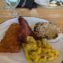 Millicent Chalet - Old and cold Scrambled Eggs and Bacon with a brick of greasy cold Hash Browns and a half a piece of English Muffin.