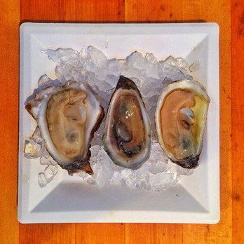 Hooked Halifax - three oysters on a bed of ice - Seafood Markets Near Me - Halifax, Nova Scotia