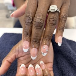 Bam&Everything Glam - Gel X short, almond extension. With French tips and bling.