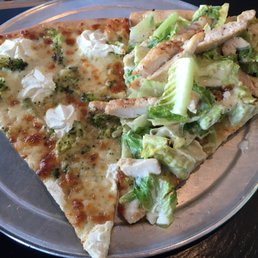 White pie w/ broccoli & Chicken Caesar. Surprisingly the Chicken Caesar was super tasty after being heated! White pie w/ broccoli & Chicken Caesar. Surprisingly the Chicken Caesar was super tasty after being heated!