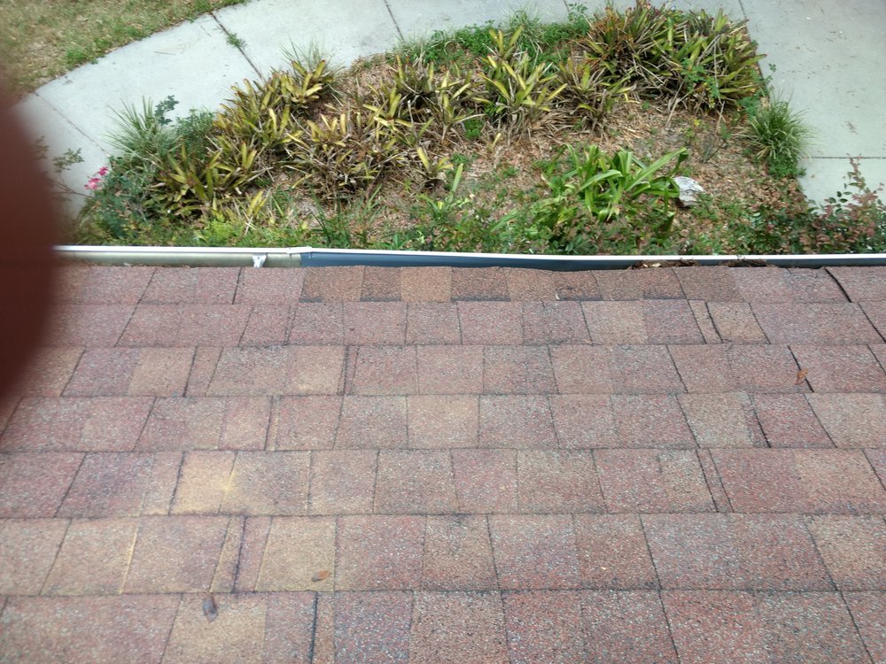 Slide of RC Roofing Florida