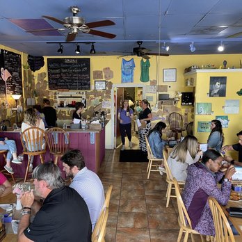 Three Little Birds - people sitting at tables in a restaurant - Breakfast & Brunch Near Me - Charleston, South Carolina Three Little Birds - people sitting at tables in a restaurant - Breakfast & Brunch Near Me - Charleston, South Carolina