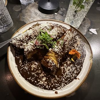 Maderas - Kitchen & Cantina - Enmolades but with beef and that yummy mole sauce - New Mexican Cuisine Near Me - Houston, Texas Maderas - Kitchen & Cantina - Enmolades but with beef and that yummy mole sauce - New Mexican Cuisine Near Me - Houston, Texas