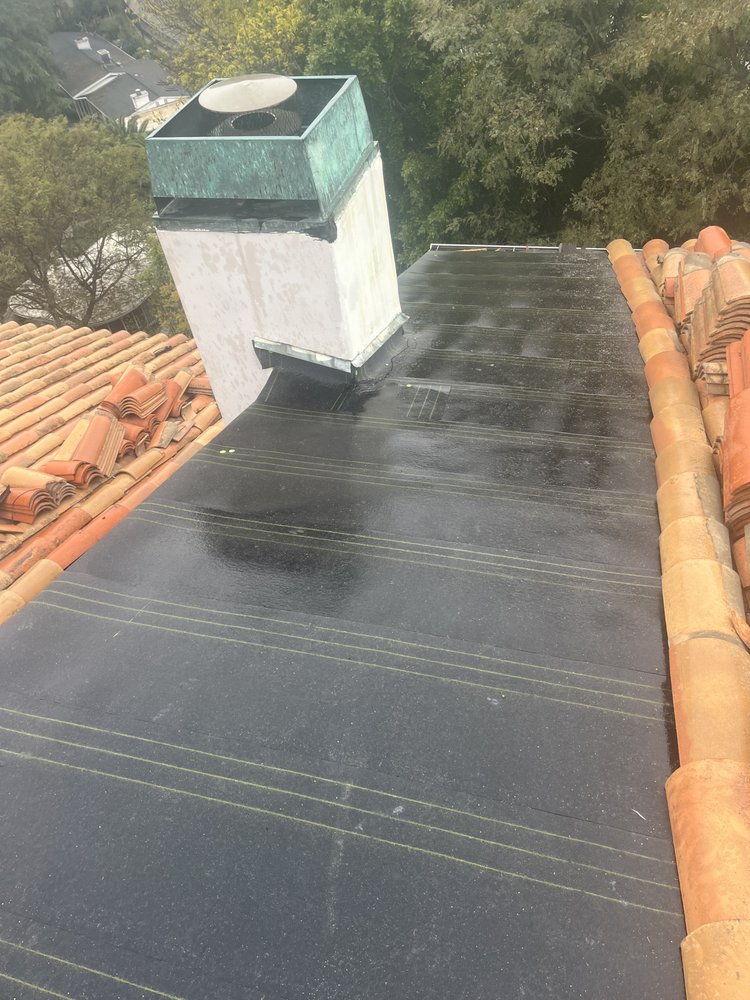 Slide of Quiroz And Sons Roofing