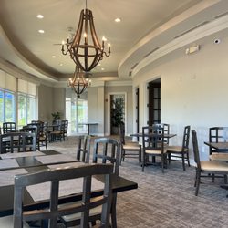 Peninsula Golf & Racquet Club - Dining room area. They have a private area and a bar area.