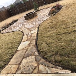 SF Services & Training Solutions - Walk way with fireplace, flowerbeds
