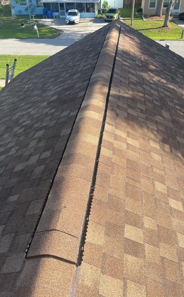 Slide of S F Roofing Quest