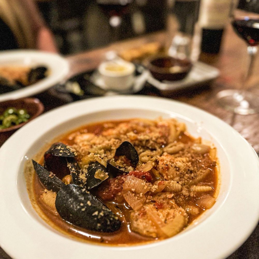 Emilia - a plate of food and a glass of wine - Italian Near Me - Knoxville, Tennessee