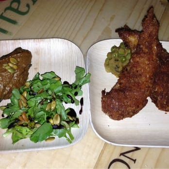 Bevy - Cheese Tamale with kabocha mole and pumpkin seeds $5. (Left) fish fry with bacon mashed peas $5 - Cocktail Bars Near Me - Honolulu, Hawaii