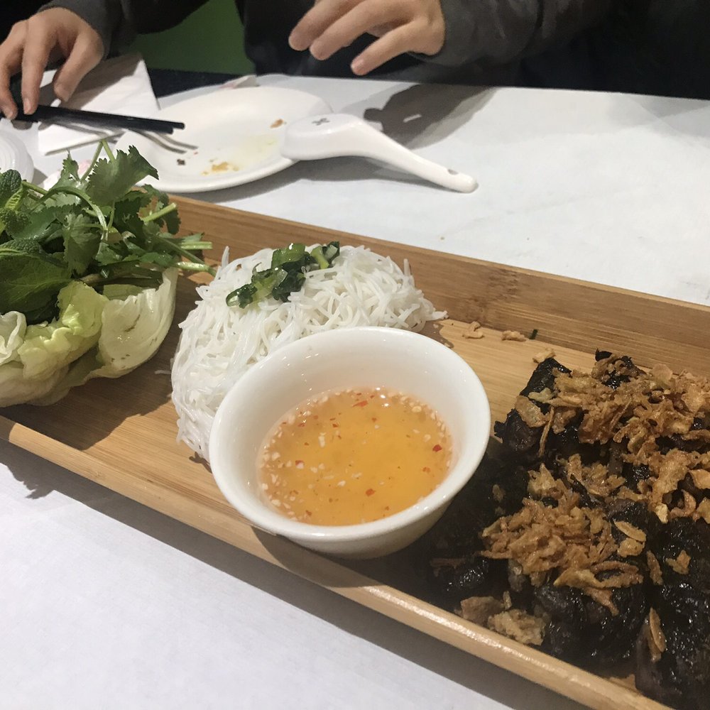 Tay Do Cafe - Bo La Lot(Grilled beef wrapped in Betel leaf)Comes w/fresh veggies, cold noodles, rice paper wraps(not included in photo), and fish sauce. - Vietnamese Near Me - London, XGL