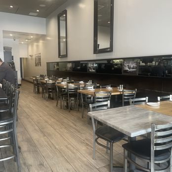 Hummus Bar & Grill - One of the side dining area when you enter the restaurant - Mediterranean Near Me - Tarzana, California Hummus Bar & Grill - One of the side dining area when you enter the restaurant - Mediterranean Near Me - Tarzana, California