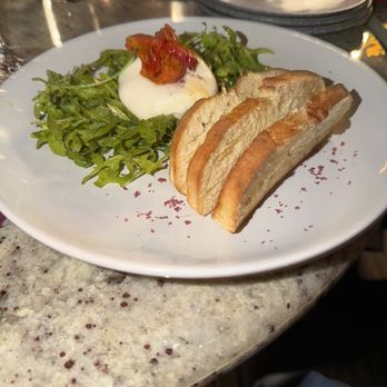 VINIA Wine & Kitchen - Burrata al pesto di pomodori secchi e rucola// Burrata, sundried tomatoes pesto and arugula - Wine Bars Near Me - Winter Park, Florida VINIA Wine & Kitchen - Burrata al pesto di pomodori secchi e rucola// Burrata, sundried tomatoes pesto and arugula - Wine Bars Near Me - Winter Park, Florida