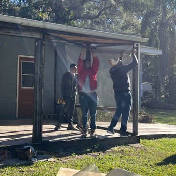 Fox Construction y More - a group of men working on a house - General Contractors Near Me