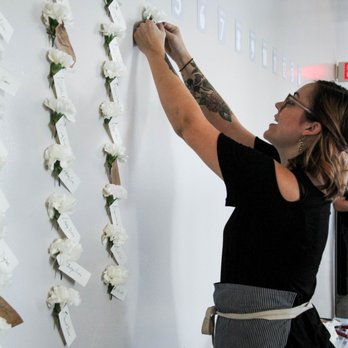 Nature Rules - Jaynie, bringing our vision for a "flower wall" seating chart to life! - Florists Near Me