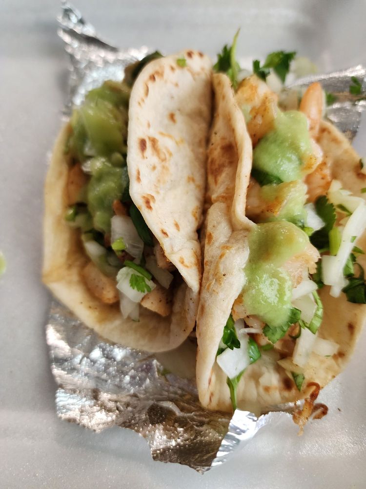 La Sabrosa Tacos Y Mas Logo