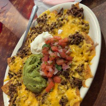 Mariachis de Jalisco #3 - Nacho supreme Barbacoa taco on flour - Mexican Near Me - Taylor, Texas Mariachis de Jalisco #3 - Nacho supreme Barbacoa taco on flour - Mexican Near Me - Taylor, Texas
