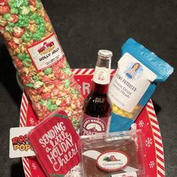 Rooster's Gourmet Popcorn - Give an assortment of Utah based products. (Except soda)