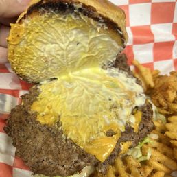 Most topping were on the bottom like the lettuce, tomato, pickles and ketchup. Most topping were on the bottom like the lettuce, tomato, pickles and ketchup.