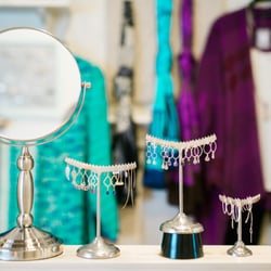 In the Clover - Customers are welcome to try things on and see how they look. Of course!