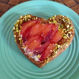 Blood orange flaky heart with cream and pistachios. DELICIOUS Blood orange flaky heart with cream and pistachios. DELICIOUS
