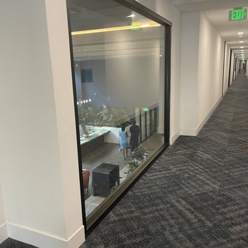 550 Harborfront - Homeless people sleeping in their new lobby living room - Apartments Near Me - San Pedro, California