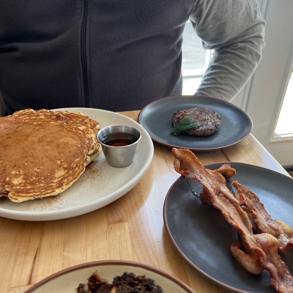Pancakes, homemade sausage and local bacon