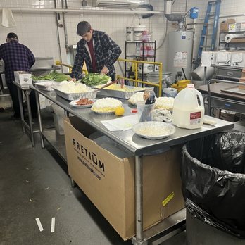 Anderson Catering - The guys are prepping meals for holiday catering - Caterers Near Me - Charlotte, North Carolina