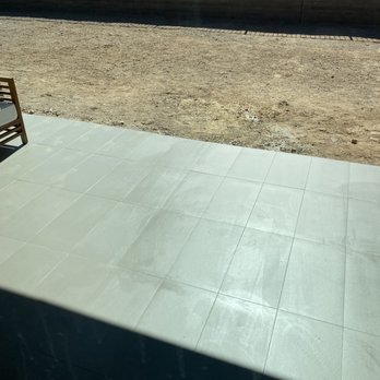 Desert Prestige Builders - a bench on a patio - Flooring Near Me