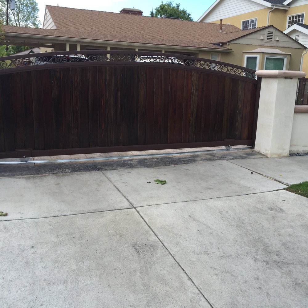 Foothill Fence - Front of driveway gate and some of iron fence - Fences & Gates Near Me Foothill Fence - Front of driveway gate and some of iron fence - Fences & Gates Near Me