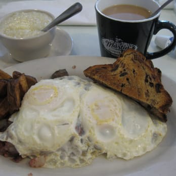Fox Restaurant - coffee with eggs over medium, corn beef hash, grits, home fried potatoes & raisin bread - American Near Me - Jacksonville, Florida Fox Restaurant - coffee with eggs over medium, corn beef hash, grits, home fried potatoes & raisin bread - American Near Me - Jacksonville, Florida