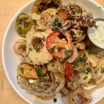 Grassa - Fritto Misto (half calamari, other half is Calabrian chiles, fennel, and lemon wheels) with a Caper Mayo dipping sauce - Italian Near Me - Portland, Oregon Grassa - Fritto Misto (half calamari, other half is Calabrian chiles, fennel, and lemon wheels) with a Caper Mayo dipping sauce - Italian Near Me - Portland, Oregon