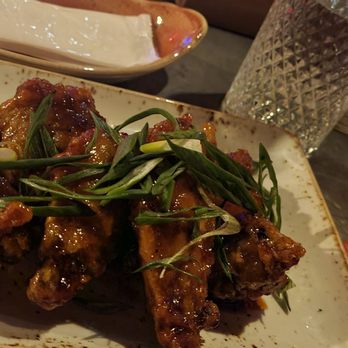 Cellar 335 - Korean chicken wings... Delicious... perfectly covered in that Awesome Sauce... - Cocktail Bars Near Me - Jersey City, New Jersey Cellar 335 - Korean chicken wings... Delicious... perfectly covered in that Awesome Sauce... - Cocktail Bars Near Me - Jersey City, New Jersey