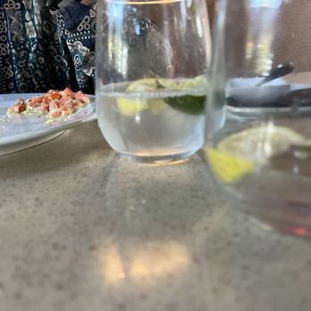 Toscano - San pellegrino, and an empty plate - Italian Near Me - Draper, Utah