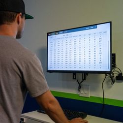 GolfShac - Matt checking average carry distance and side spin