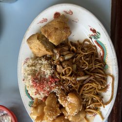 Eddy's Chinese & American Restaurant - Combination #1. Sweet and sour chicken, pork fried rice, chicken soft low mein, and an egg roll.