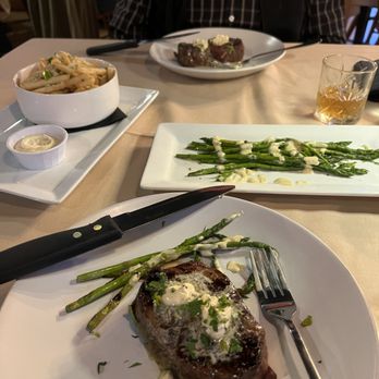 Strip Steak House - 8 ounce Beef tenderloin with garlic butter, roasted asparagus, Parmesan French fries. - Steakhouses Near Me - Sheboygan Falls, Wisconsin Strip Steak House - 8 ounce Beef tenderloin with garlic butter, roasted asparagus, Parmesan French fries. - Steakhouses Near Me - Sheboygan Falls, Wisconsin