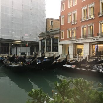 Cavalletto Hotel - Our view at breakfast. Watching the gondoliers prepare their boats for the day - Hotels Near Me - Venezia, VE