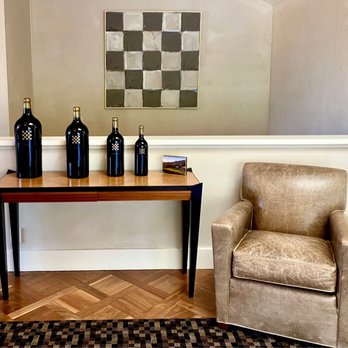 Checkerboard Vineyards - three bottles of wine on a table - Wineries Near Me - Calistoga, California Checkerboard Vineyards - three bottles of wine on a table - Wineries Near Me - Calistoga, California
