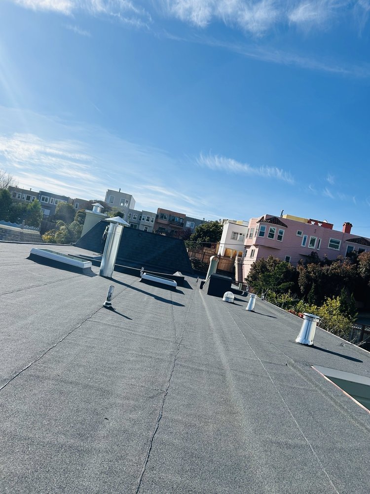 Slide of Aguilar’s Roofing Maintenance