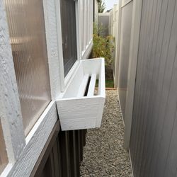 Stor-Mor Sheds - Flower box that was put on the back that I didn't ask for as we couldn't get past it so it was removed