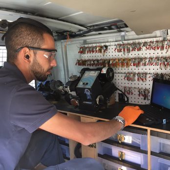 ProMaster Locksmith - Osh working on my new car key. - Keys & Locksmiths Near Me