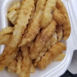 Fish House - My food a small fish filet with fries that look horrible