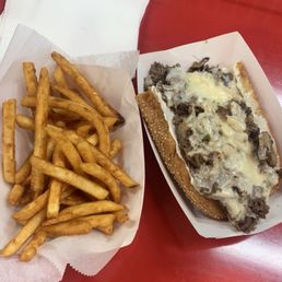 Cheesesteak sub with fries
