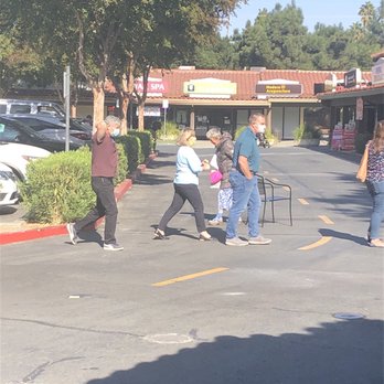 Ygnacio Plaza - Joan pulling chairs - Shopping Centers Near Me - Walnut Creek, California