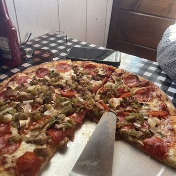 Tiny cafe - a pizza with a slice missing - Burgers Near Me - Carrizozo, New Mexico
