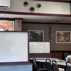 Los Arcos - Dining Area/Almost fallen off decoration far right pot on ceiling