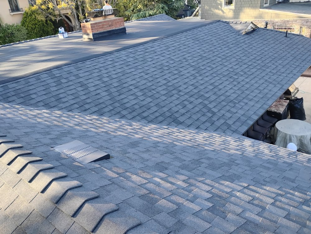 Slide of Sam's Roofing Co