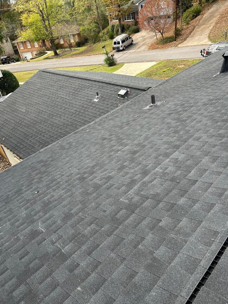 Slide of Dos Amigos Roofing