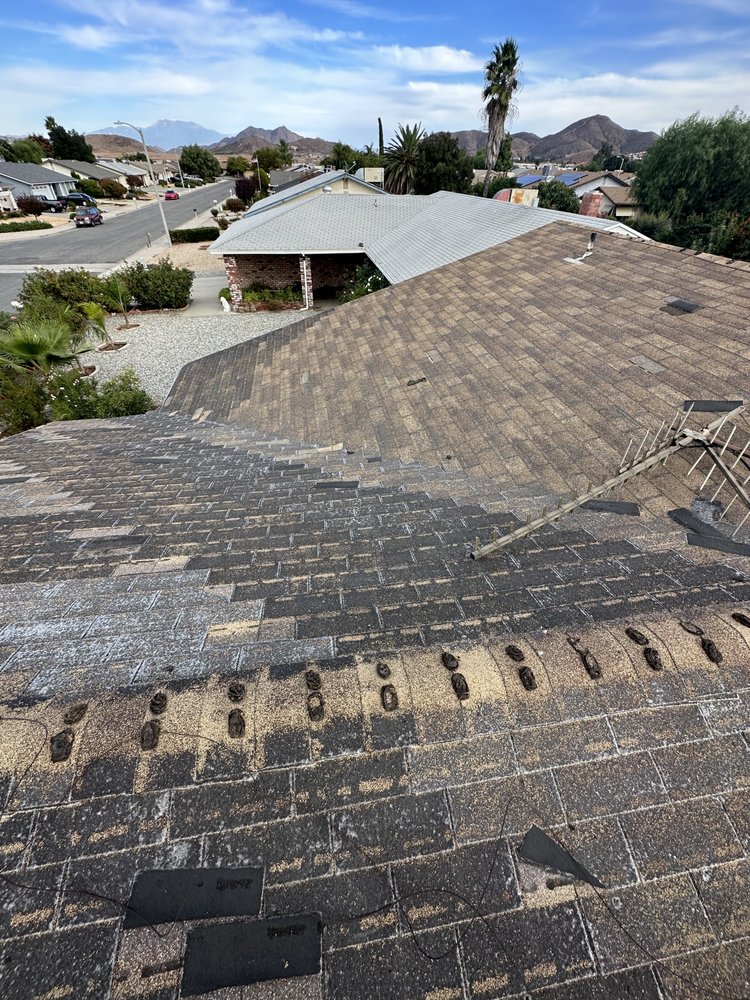 Slide of All out Roofing and Construction