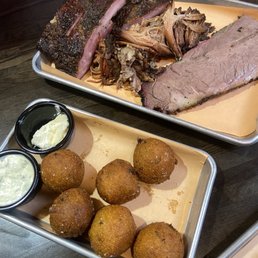 Hush puppies, Pork Ribs, Price per Pound, Pulled Pork 1/4 lb., Brisket 1/4 lb. Hush puppies, Pork Ribs, Price per Pound, Pulled Pork 1/4 lb., Brisket 1/4 lb.